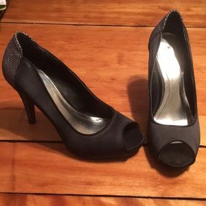 Black shoe with silver sequined heel